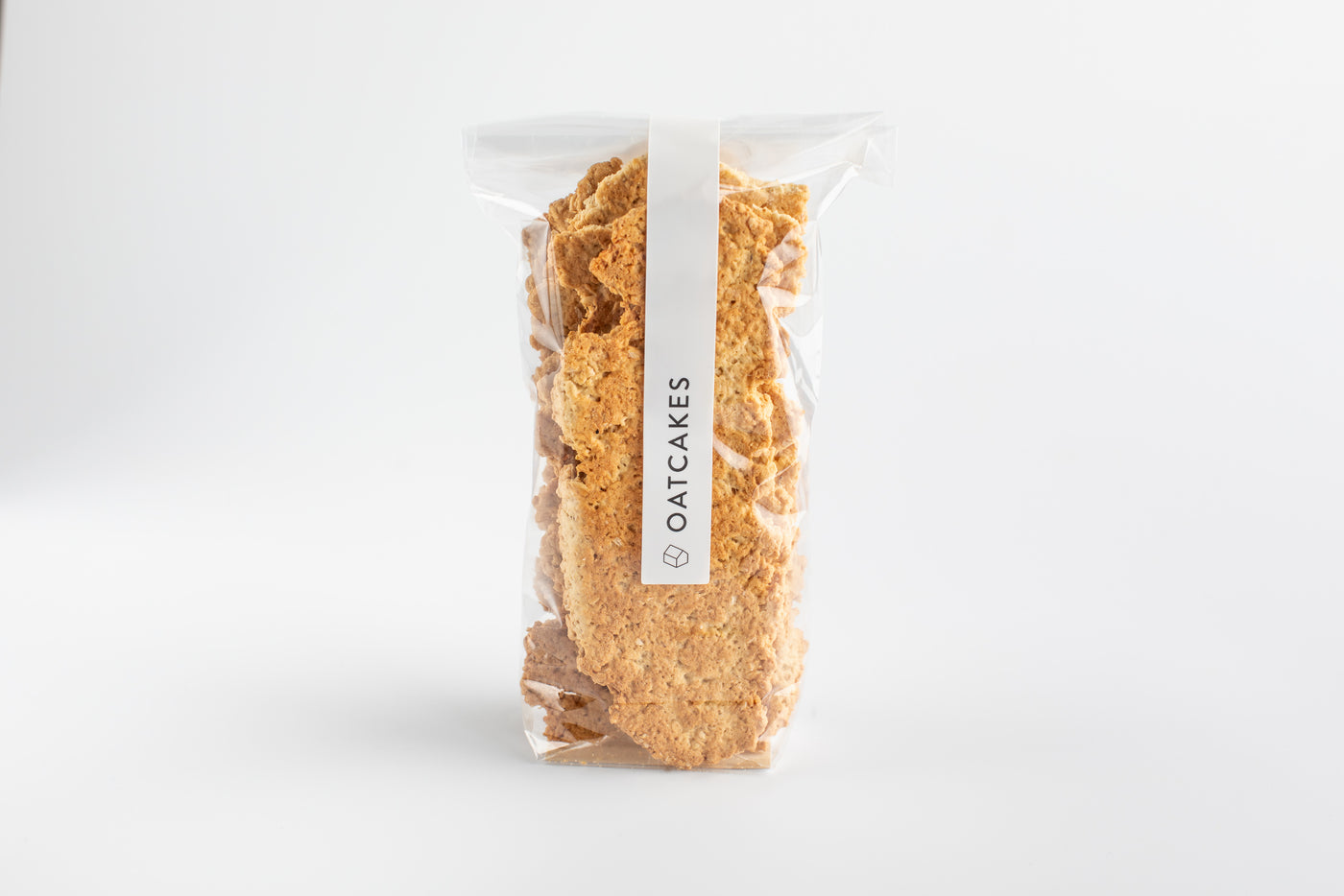 Packaged oatcakes with a visible brand label on a white background