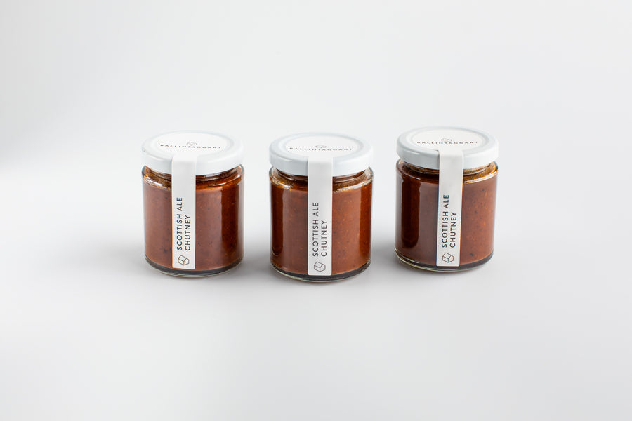 Three jars of Scottish Ale Cider on a white background